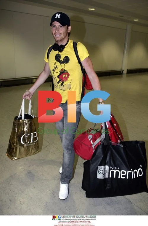 Joe Swash Arrives at Heathrow