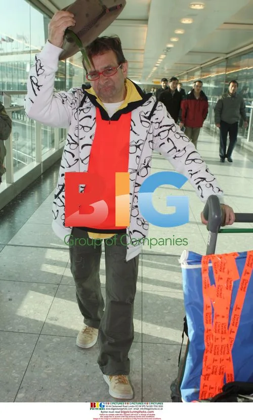 Timmy Mallett and Robert Kilroy Silk arrive at Heathrow