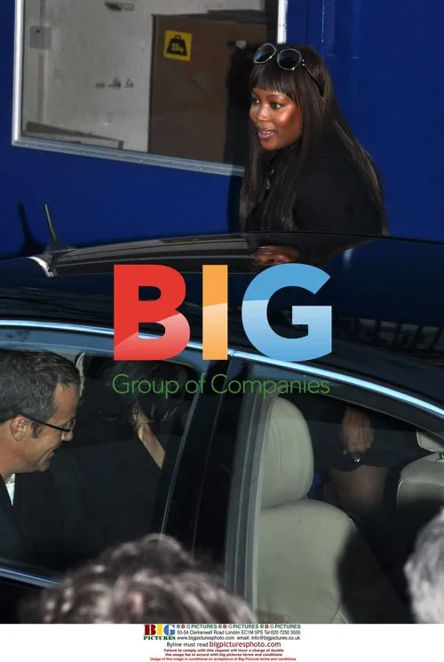Naomi Campbell leaves hotel with boyfriend