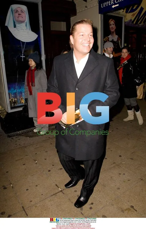 Daniel Evans buys Big Issue at X-Factor wrap party