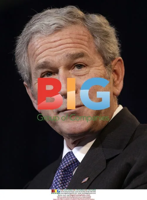 George W. Bush and Laura Bush at portrait unveiling