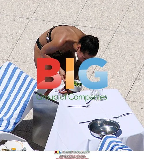 Alicia Keys Relaxes Poolside in Australia