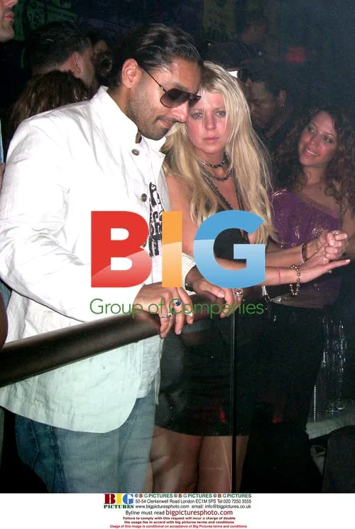 Tara Reid with Vikram Chatwal at P. Diddy party