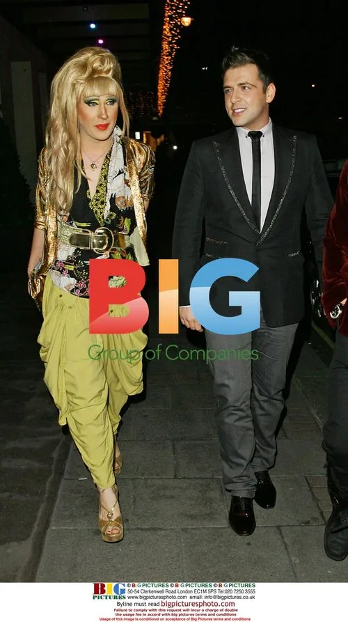 Jodie Harsh and Mark from Westlife leaving Mayfair Hotel