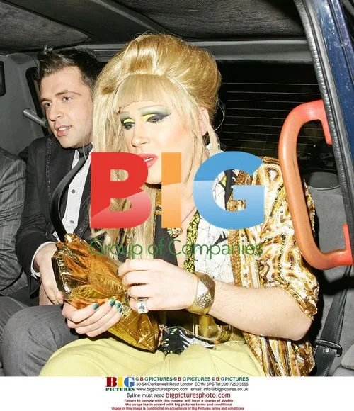Jodie Harsh and Mark from Westlife leaving hotel