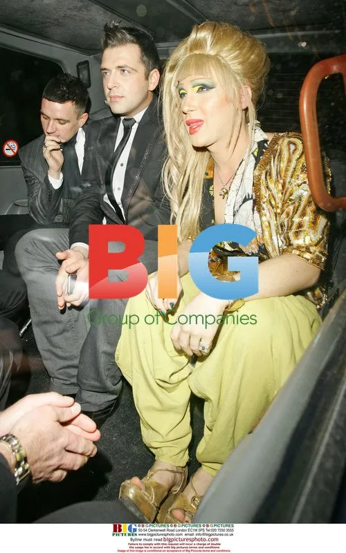 Jodie Harsh and Mark from Westlife leaving hotel