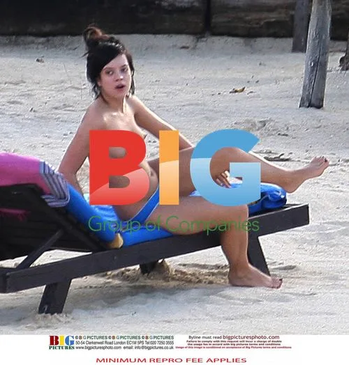 Lily Allen on Beach in Caribbean