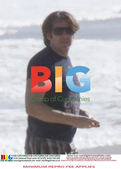 Jonathan Ross Relaxes on Beach During Suspension