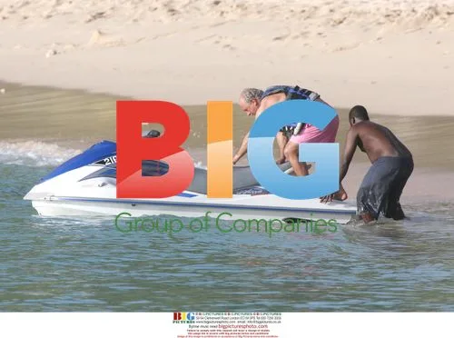 Phil Green jet skiing with daughter Chloe
