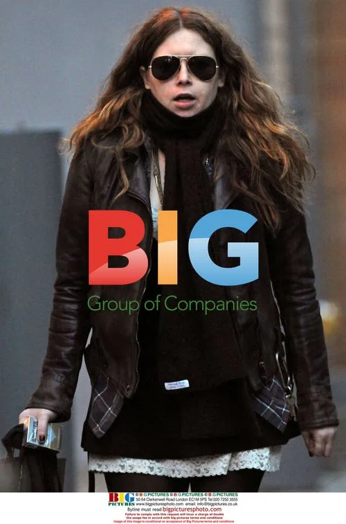 Natasha Lyonne walks by Katie Holmes's apartment