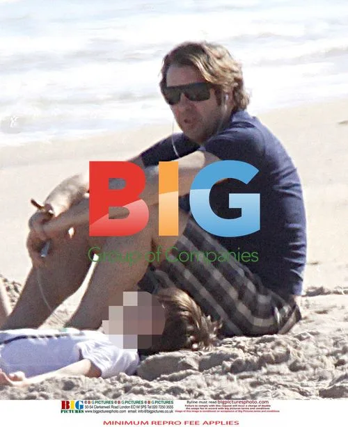 Jonathan Ross Relaxes on the Beach