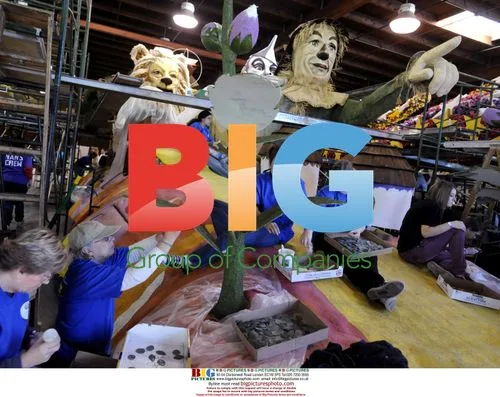 Volunteers decorate Rose Parade floats
