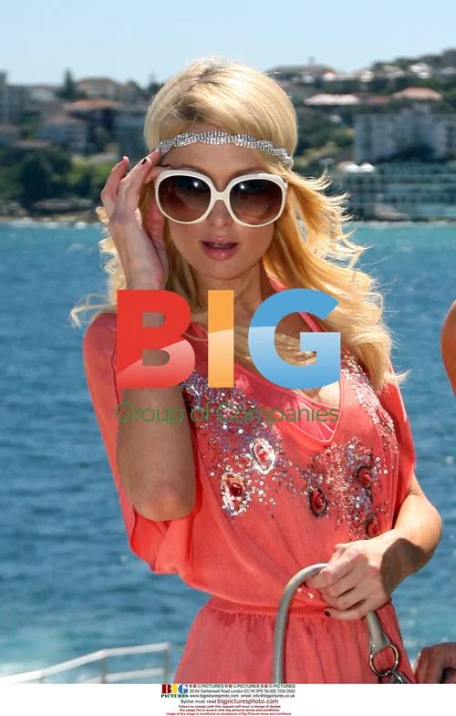 Paris Hilton Hit by Sand at Bondi Beach