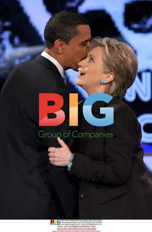 Obama and Clinton Hug After Debate