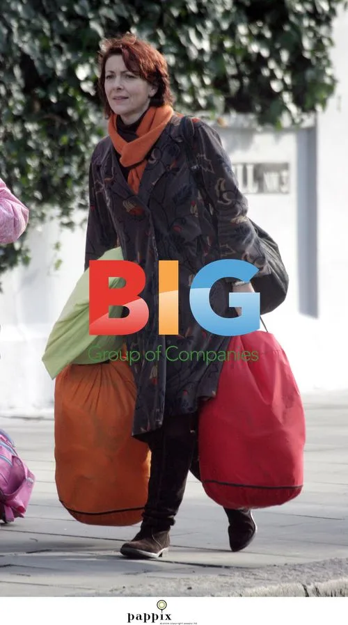 Fiona Foster carrying bags in London