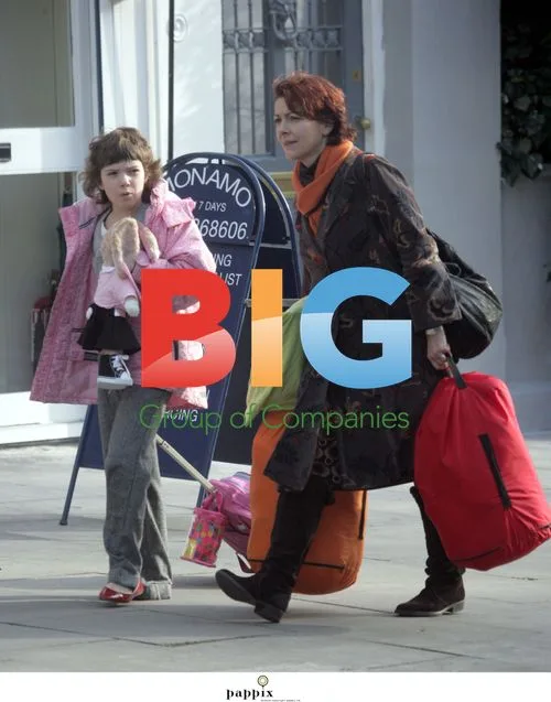 Fiona Foster carrying bags in London