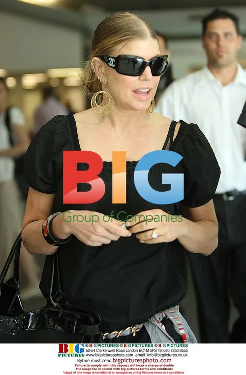 Fergie Arrives at Perth Airport