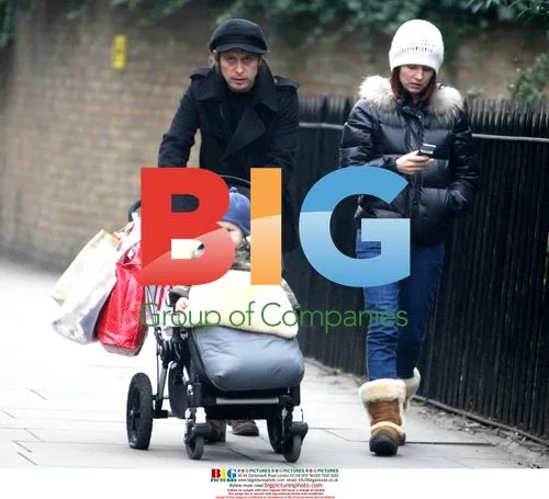 Mark Owen with girlfriend Emma Ferguson and son
