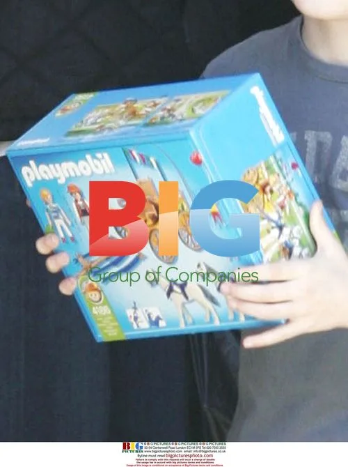 Calista Flockhart and son Liam at toy store