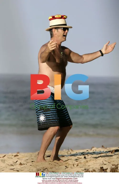 Pierce Brosnan and wife Keely Shaye Smith on Hawaiian beach