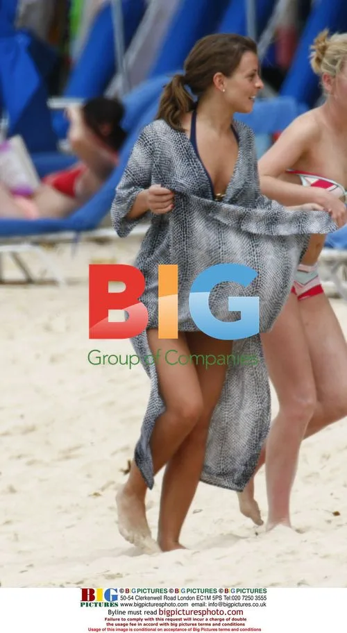 Coleen McLoughlin relaxing on Caribbean beach