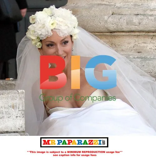 Nancy Dell'Olio Poses in Wedding Dresses