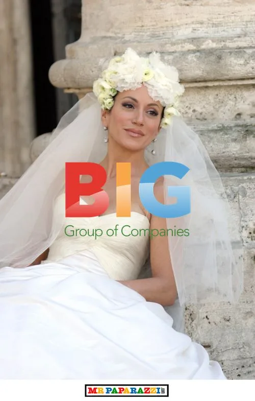 Nancy Dell'Olio Poses in Wedding Dresses in Rome