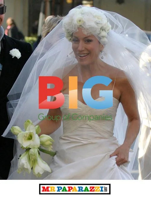 Nancy Dell'Olio Poses in Wedding Dresses