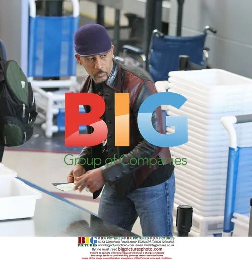 Montel Williams Departs LAX with Wife Tara Fowler