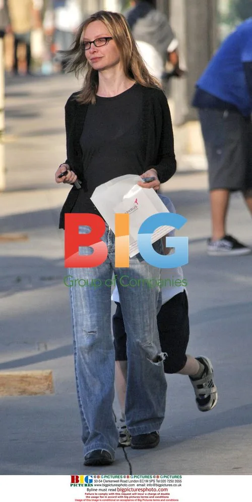 Calista Flockhart and son Liam shop