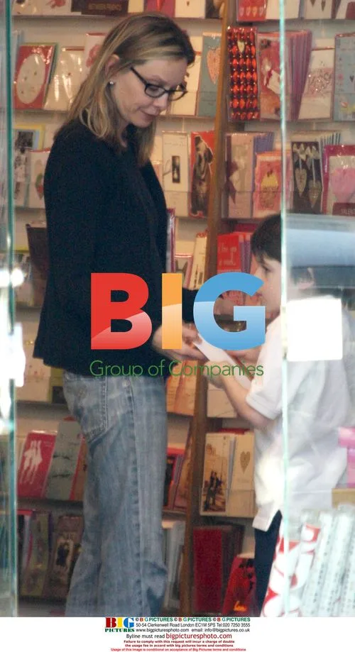 Calista Flockhart and son shop for Valentine's cards