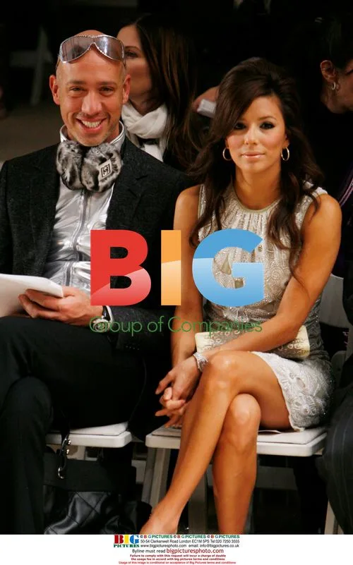 Robert Verdi and Eva Longoria attend Naeem Khan show