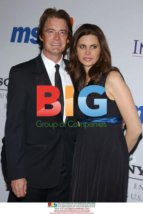 Kyle MacLachlan and Desiree Gruber at Clive Davis Pre-Grammy Party