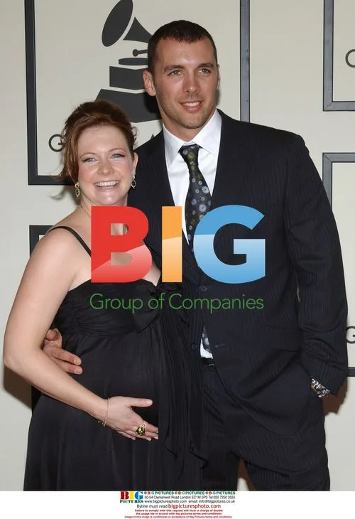 Melissa Joan Hart and Mark Wilkerson at 50th Grammys