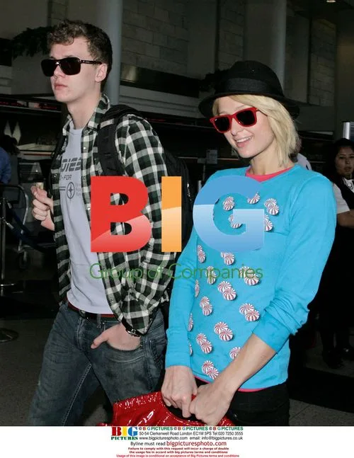 The Hilton family departs LAX for holiday