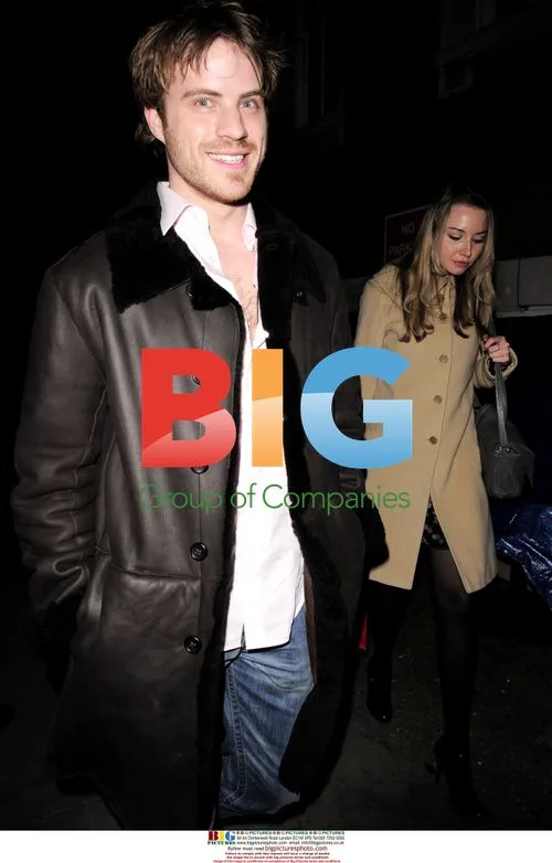 Robert Kazinsky and companion at London Fashion Week party
