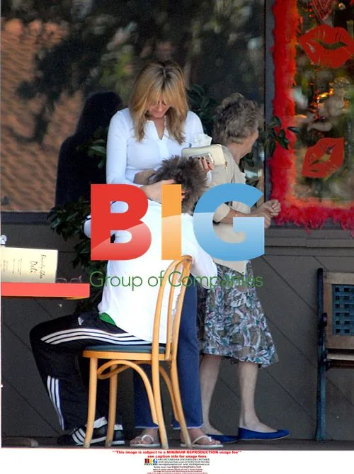 Rod Stewart with Penny Lancaster in Bel Air
