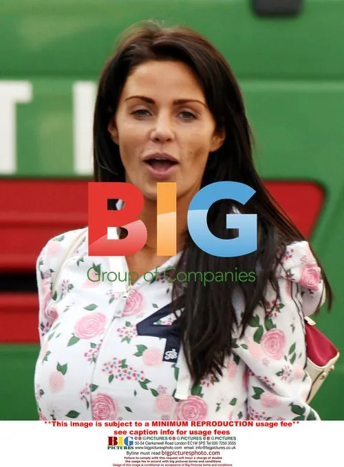 Katie Price Leaves Boots After Shopping
