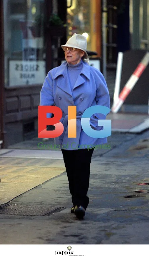 Barbara Windsor shopping at high-end store