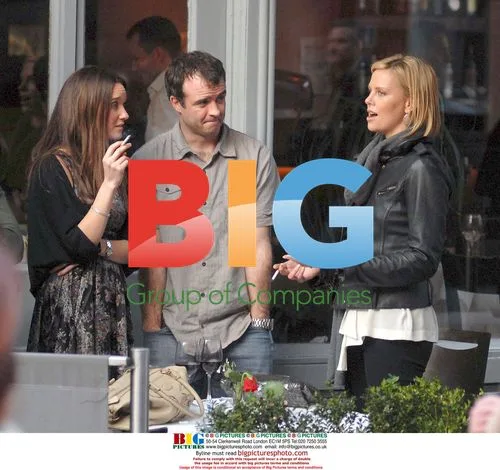 Charlize Theron and Stuart Townsend at party