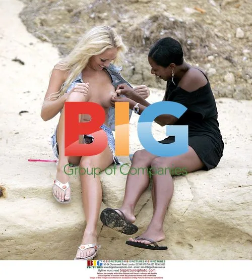 Aisleyne Horgan-Wallace and friend play with plasters
