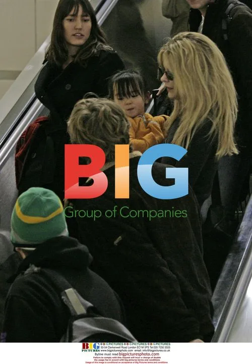 Meg Ryan with children at LAX