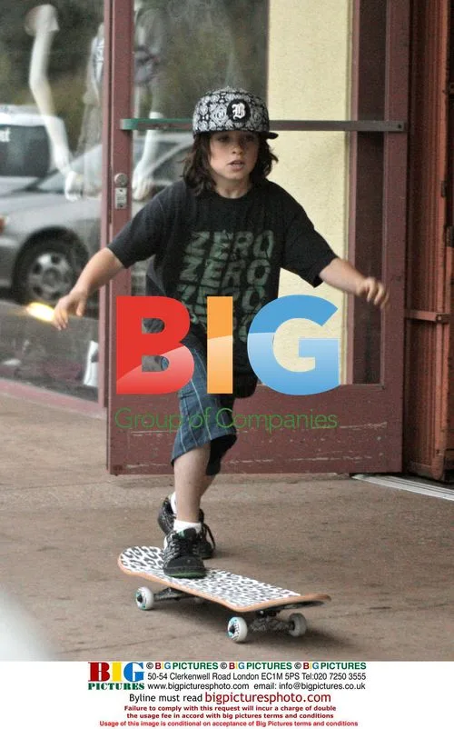 Pamela Anderson shops with sons