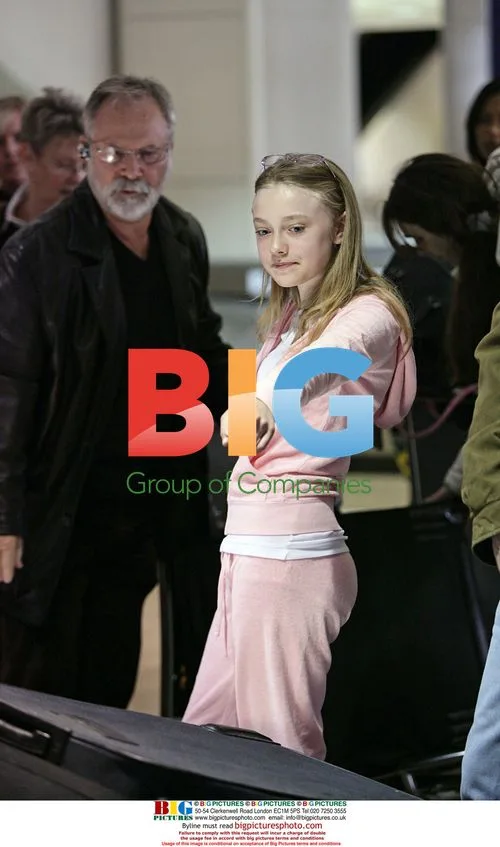 Dakota Fanning Arriving at LAX