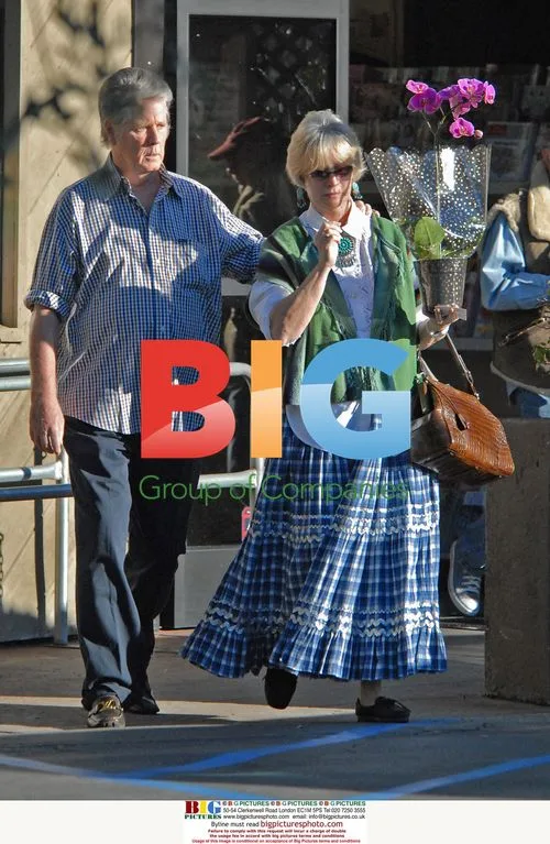 Brian Wilson and wife Melinda with flowers
