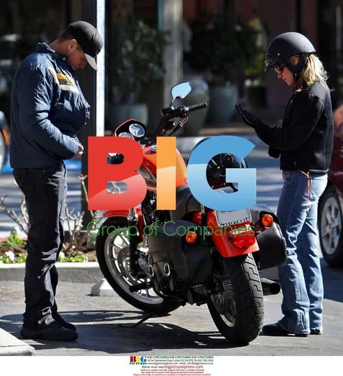 George Eads and girlfriend on motorcycle