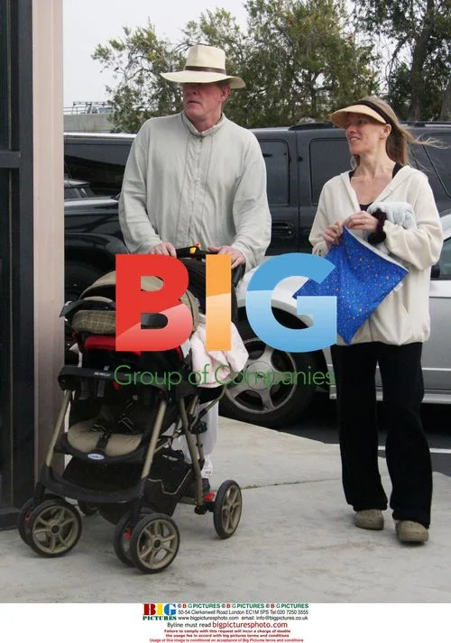 Nick Nolte and partner out with baby