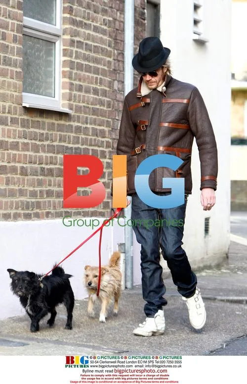 Rhys Ifans takes Sienna's dogs for a walk