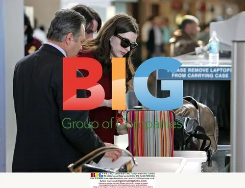 Anne Hathaway and boyfriend at LAX