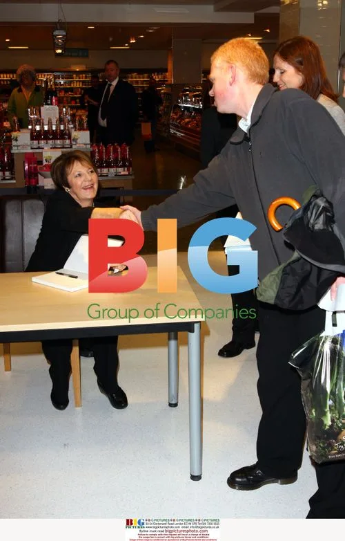 Delia Smith signs 'How To Cheat at Cooking'